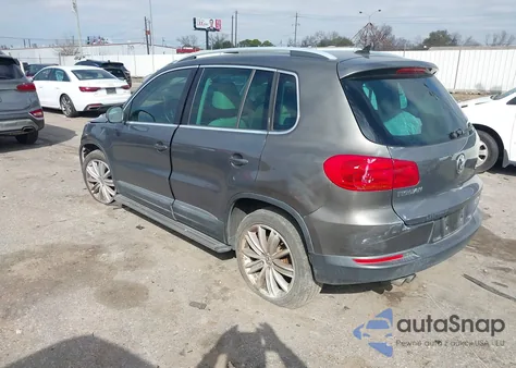 2014 Volkswagen Tiguan Sel z USA, uszkodzony, nr VIN WVGAV3AX3EW510426